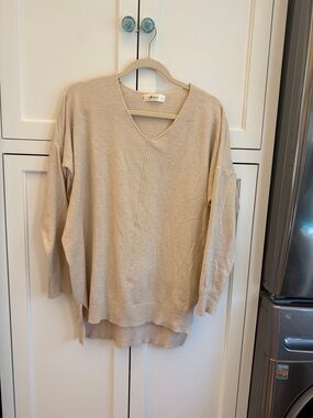 mahina Relaxed V-Neck Knit Sweater in Beige